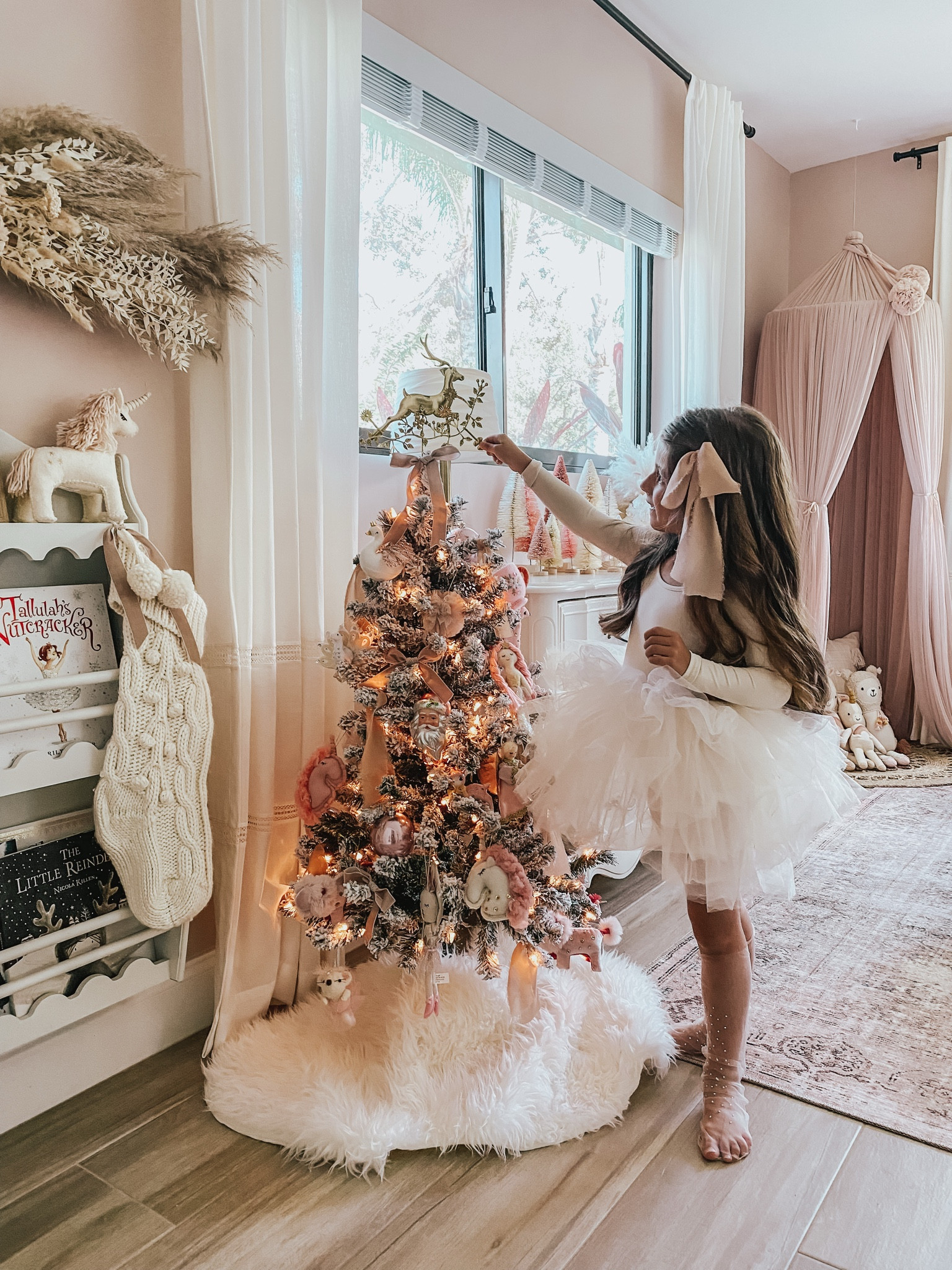 This mini flocked tree is only $35 and we used ours for 6 years before we upgraded to a bigger one 🥲 it’s so perfect for a kids room! 🤍🤍🎀

#kidschristmastree #kidstree #girlschristmastree #flockedchristmastree #toddlerchristmastree  #pinktree #girlsroom #kidsroom #christmas #holidaydecor #christmasdecor #walmartfind #walmart #tutu #ribbon #home 

#LTKFamily #LTKHoliday #LTKHome