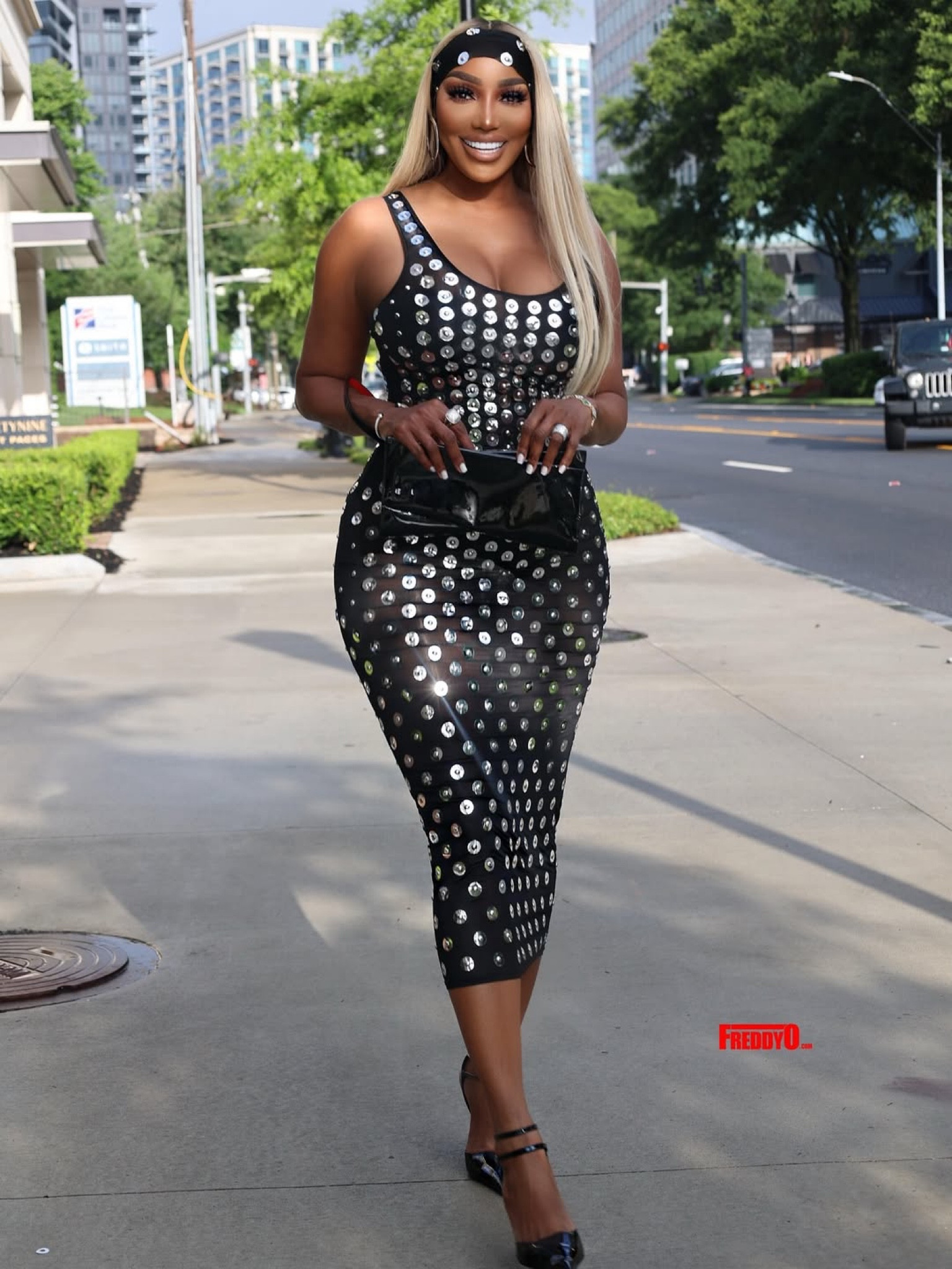 @neneleakes turned heads in a $1,710 @rabanne embroidered long dress, tailored to perfection to sculpt a flawless bodycon silhouette.

Hot! Or Hmm..?
📸: @freddyopix
#NeNeLeakes #Rabanne #RabanneDress #StyleBomb #BodyconGoals #FashionBombDaily #neneleakesfbd #freddyopix #bombstyle