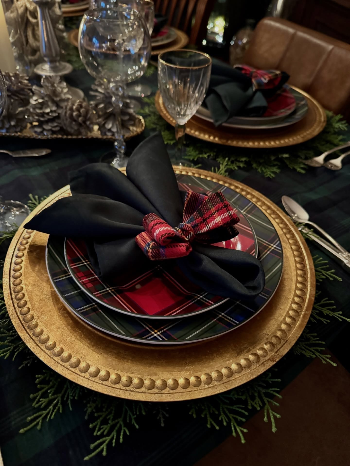 Nothing says family at Christmas like a classic Ralph Lauren-inspired table. 🎄✨

Leaned into that timeless, moody aesthetic this year—rich tartans, silver accents, and a lush, homemade centerpiece filled with deep red roses and fresh evergreens. There is truly nothing better than family gathered around a table sharing stories of the past year and enjoying each other’s company

Loved mixing my favorite vintage silver items with some new classics like plaid plates from Pottery Barn and gorgeous wine glasses from Anthropologie! Those napkin bows from Sur La Table were great too…so festive and great quality!

If you’re looking to recreate this look for next year, so many of these pieces are currently on sale!

#ChristmasTablescape #RalphLaurenHome #HolidayHosting

#LTKHome #LTKHoliday #LTKSaleAlert