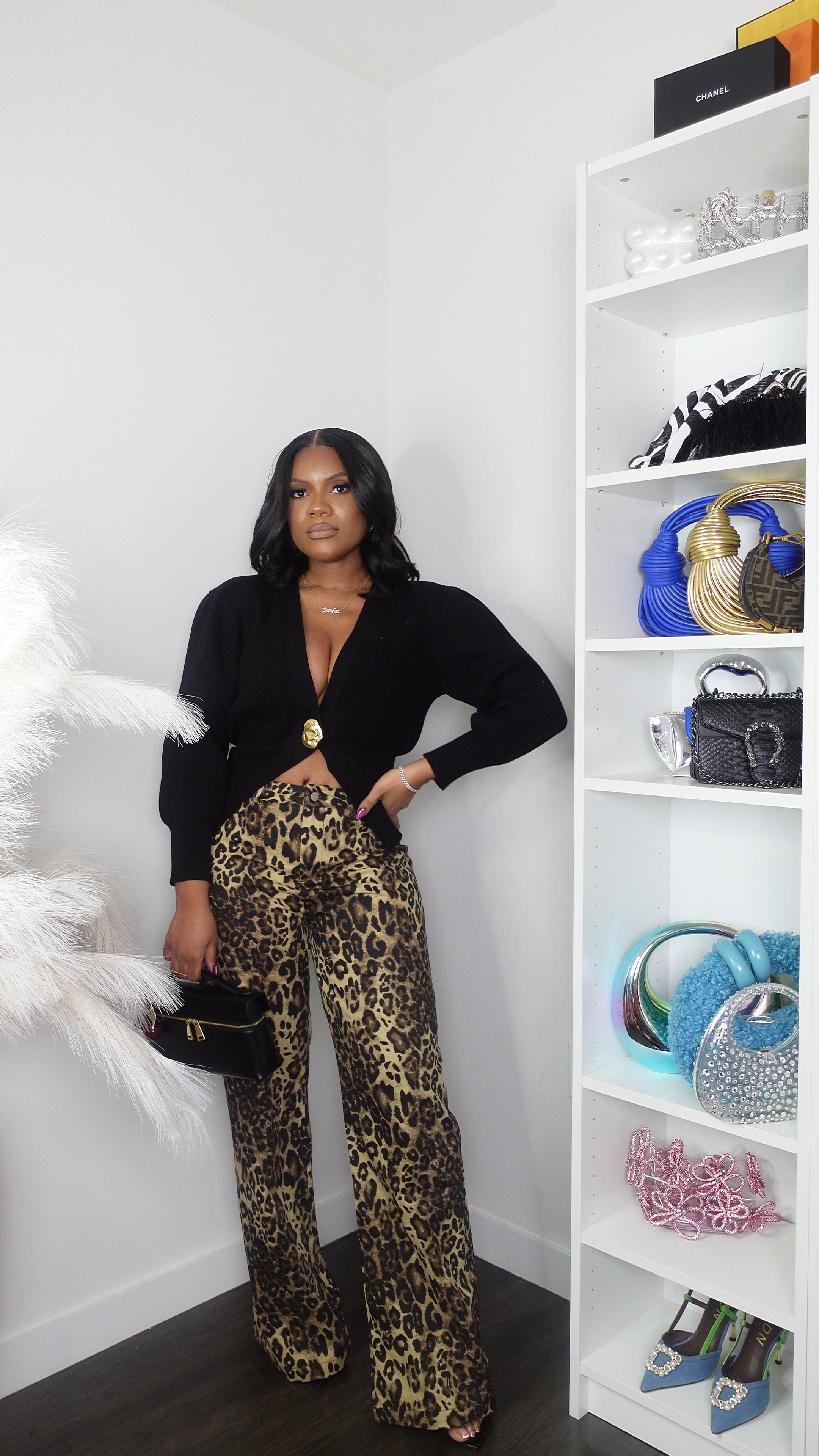 I wearing a small in the sweater & a medium in the pants. Fall outfit, animal print pants, fall purse, sweater 

#LTKStyleTip #LTKFindsUnder100 #LTKFindsUnder50