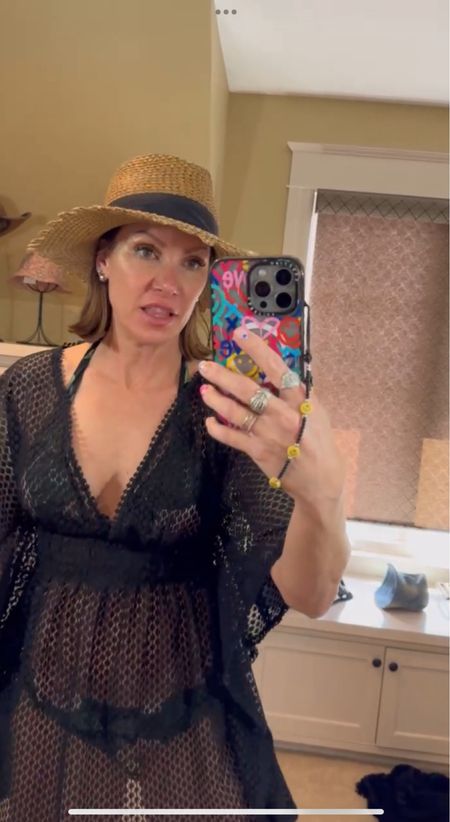 Mixing and matching high end items with more affordable items is something I love to do! The bathing suit is Dolce Gabbana cover up is target. I love the way the cover up shows just enough without being too revealing. 

#LTKover40 #LTKstyletip #LTKtravel