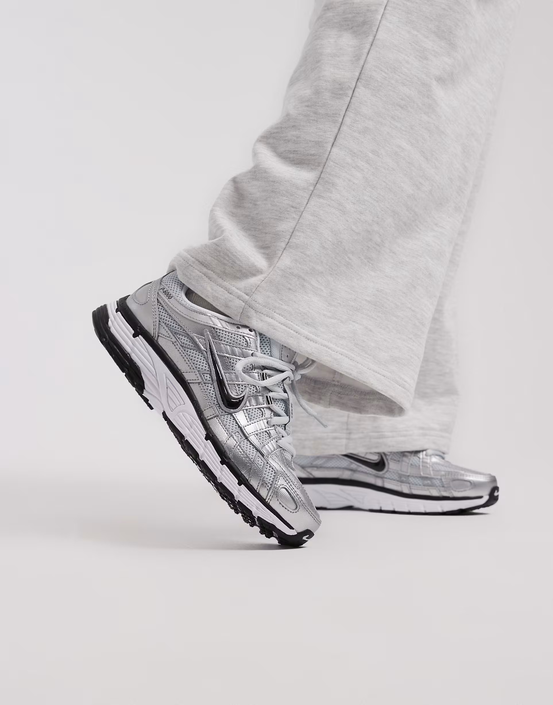 Nike P-6000 unisex trainers in silver and black | ASOS (Global)