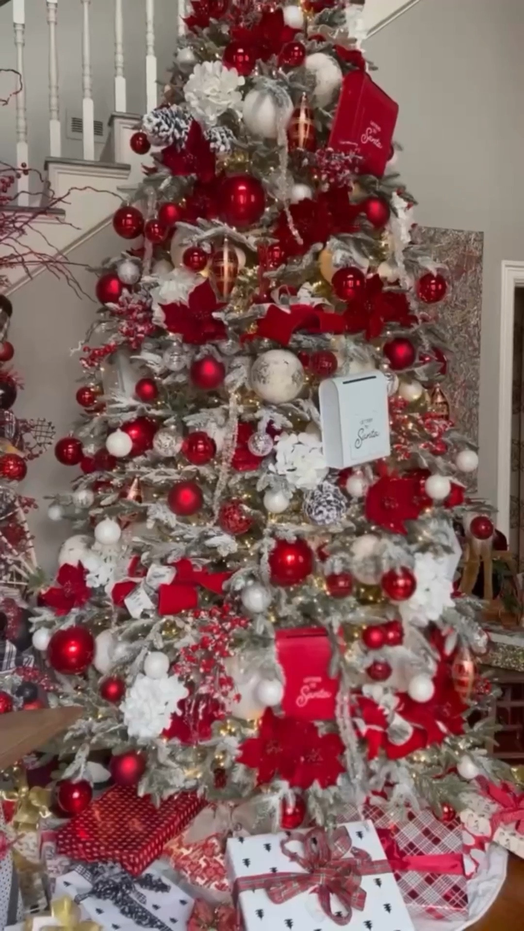 Comment “Designs” for a link to this Letters To Santa Christmas tree design and shop my lights, ribbon, and ornaments.

On this tree, you’ll find gorgeous candy apple red ornaments, beautiful birch ribbon, rich red velvet ribbon, and warm white snake lights perfect for tall trees like this 10 footer.

#Christmas #christmaslights #christmasdecor #christmasdecorating #holidaydecor #holidaylights #christmastree #christmasdecorations #christmastreedecorating #holidayseason #holidayhome #santa #ribbon

#LTKHoliday #LTKHome #LTKSeasonal