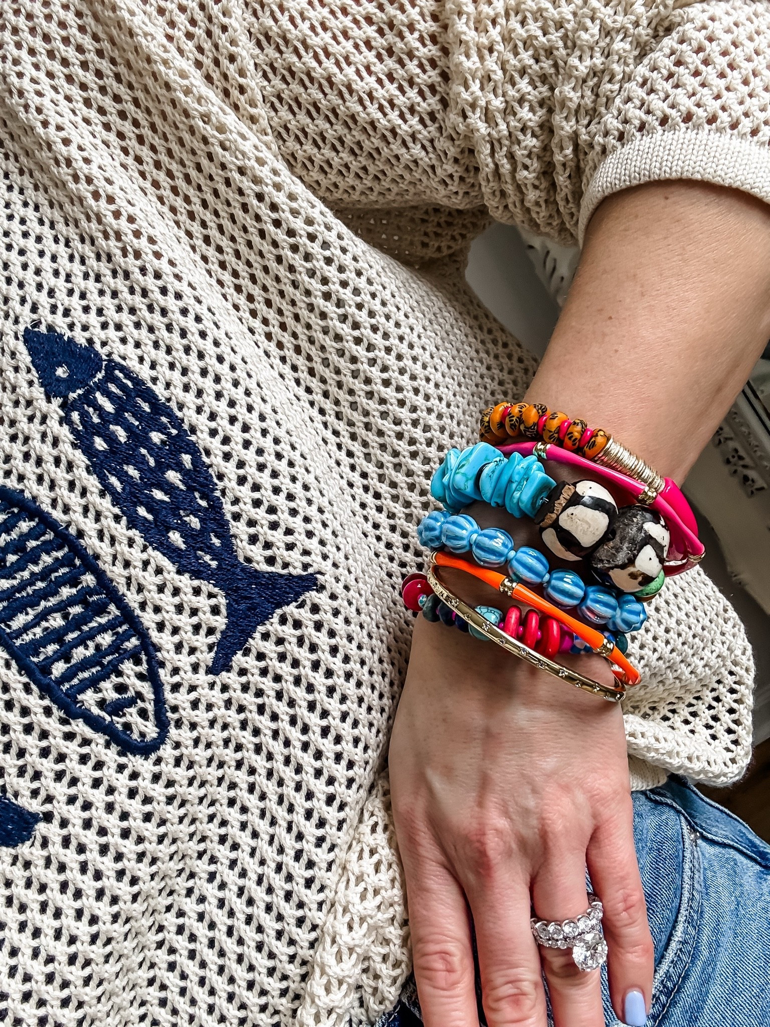 Code: HOUSEOFLEO20. Summer jewelry, bracelet stack. Beaded bracelets.

#LTKSaleAlert #LTKOver40