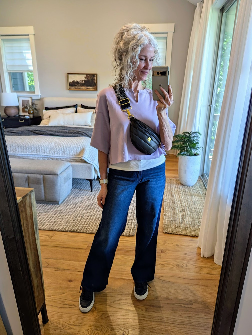 $22 jeans! My go-to jeans. I have them in all 4 washes. Wide leg, but not too wide, super comfortable and true to size-wearing a 4. Ugg sneakers are an older style, Think Royln crossbody, target tank and I cut the sleeves and hem off of my sweatshirt.
#fashionover60 #over50 #over60style 

 #LTKOver40 #LTKFindsUnder50 #LTKStyleTip