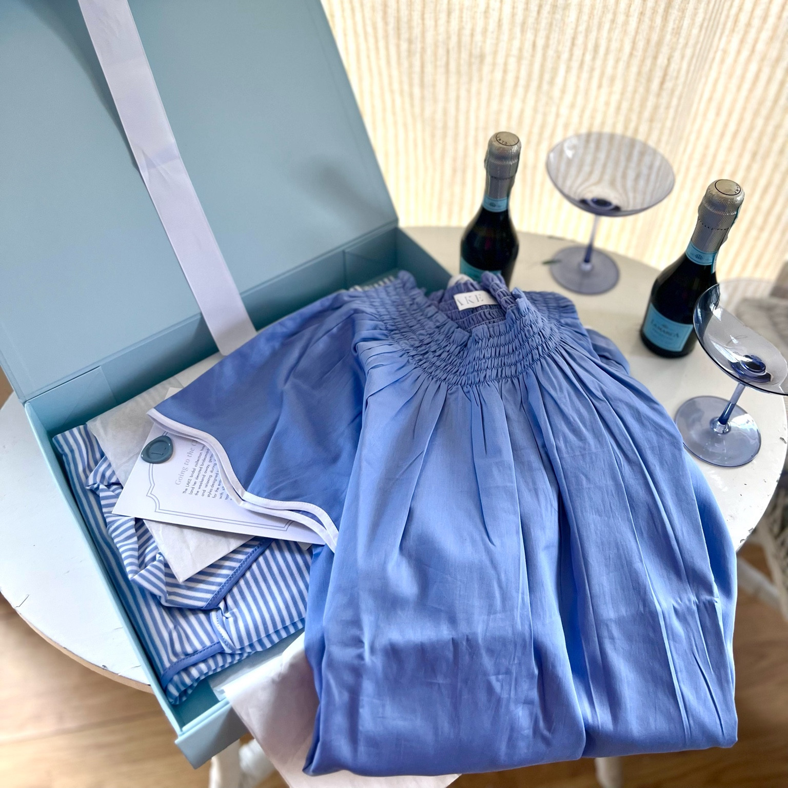 Pop the bubbly 🥂 LAKE launches bridal! Covering the bride and bridesmaid’s something new and something blue to make wedding day dreams come true. With matching getting ready gear becoming the norm for bridal parties this is the perfect new collection for LAKE to offer! There are silhouettes to flatter every body type, timeless colors to complement your color scheme, and fuss free necklines to avoid messing up your hair and makeup! I shared a few of my favorite styles offered in today’s blog post at www.PrepInYourStep.com. If you do decide to gift these to your girls, don’t forget LAKE’s beautiful blue gift boxes to check  wrapping bridesmaid’s gifts off your ever growing wedding to-do list! 

#LTKunder100 #LTKwedding #LTKGiftGuide