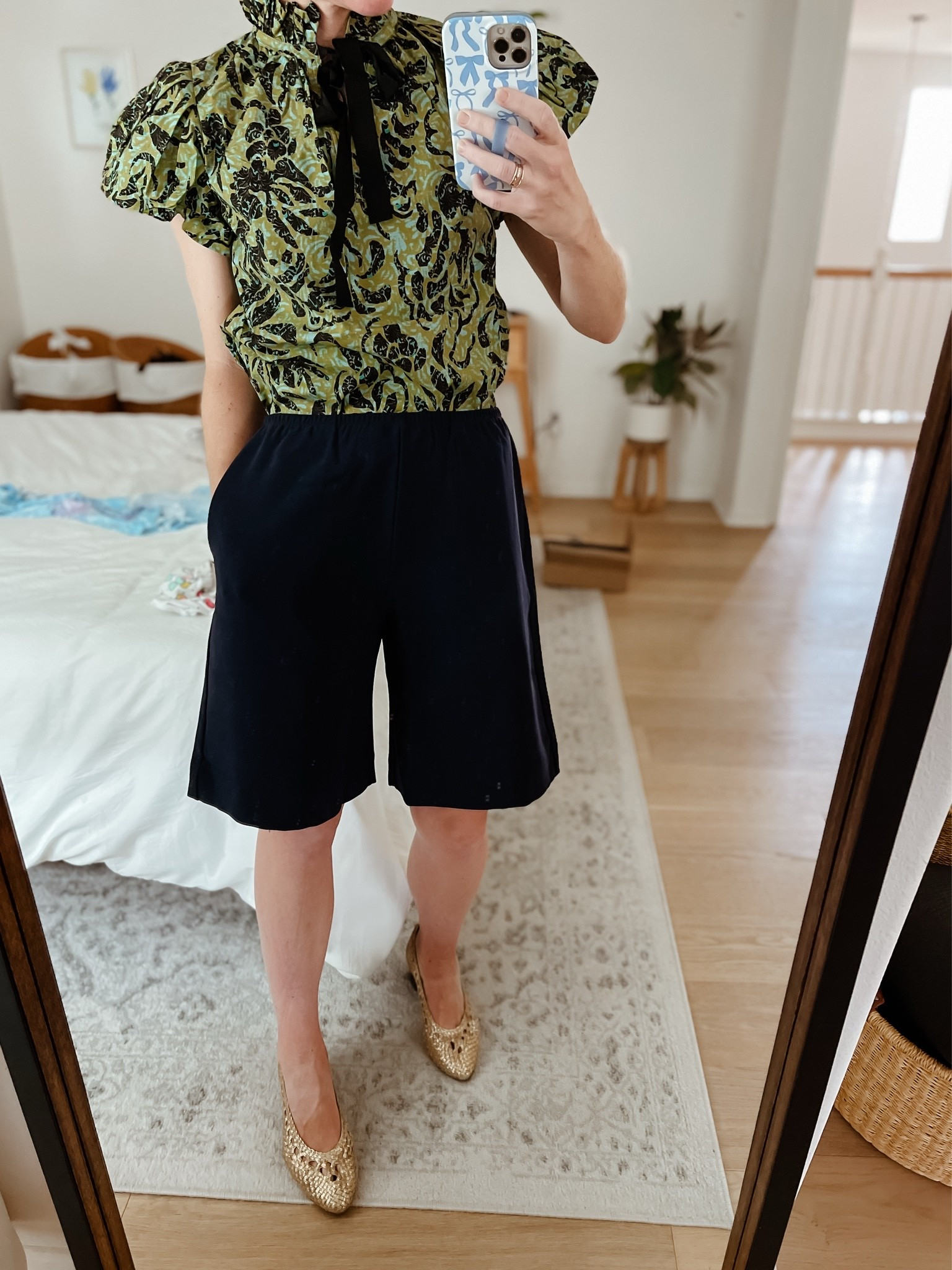 Two new pieces I LOVE for fall. Just got this top and it’s a stunner. Also comes in a teal and yellow version (linked). It fits TTS, wearing a 4. The shorts are so much better than expected. A crepe material which can be dressed up or down, with pockets and an elastic waistband. They also fit TTS, wearing a small.

#LTKootd #LTKmomlife #LTKSeasonal