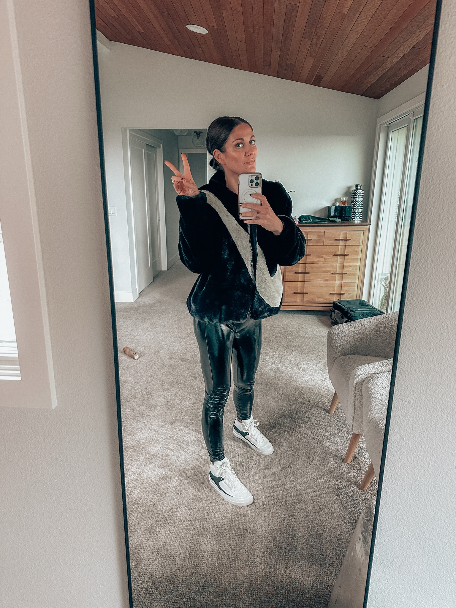 Gameday fit. Faux fur. Football fashion. Liquid leggings. Black and white Gameday outfit  

#LTKGiftGuide #LTKStyleTip #LTKOver40