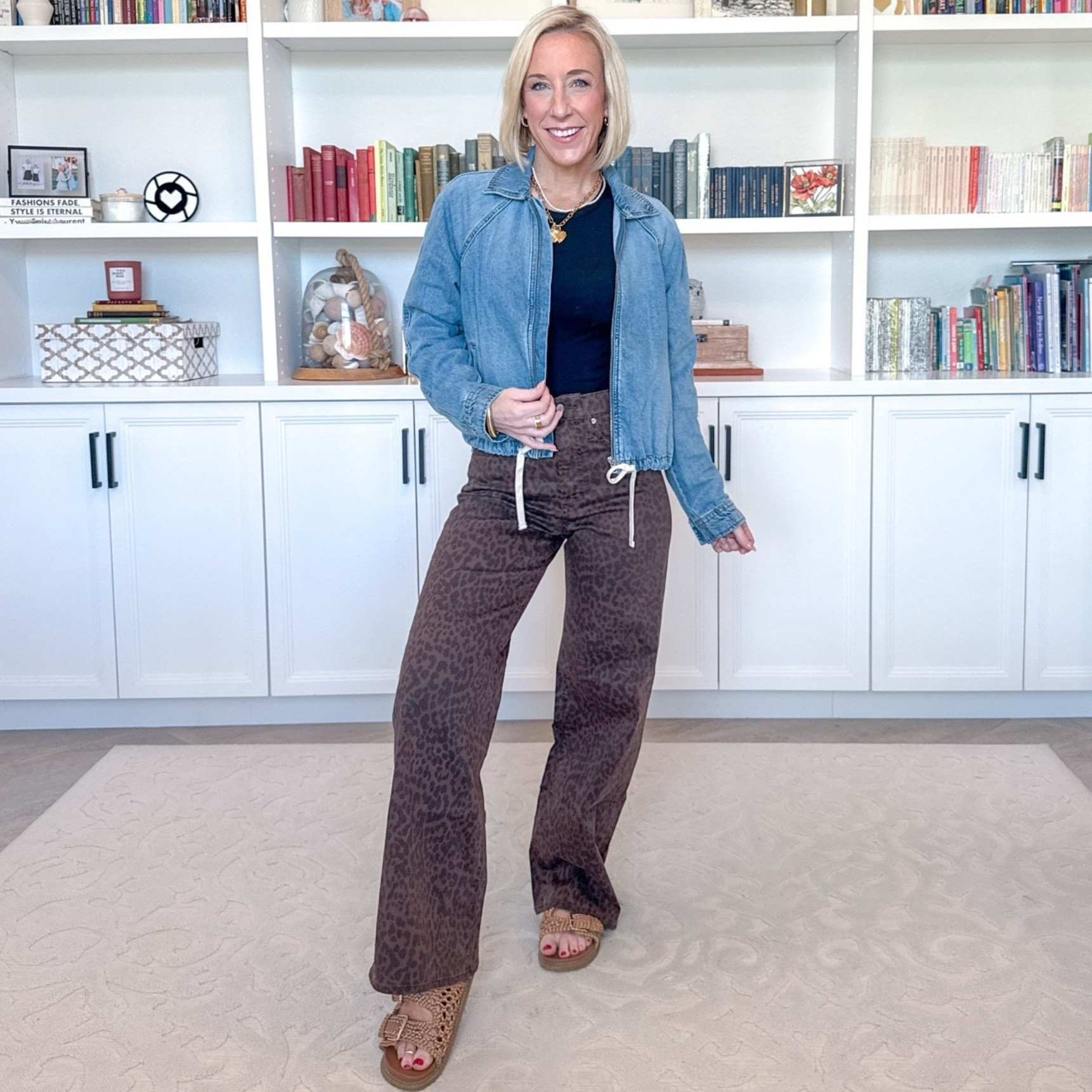 Leopard Jean - 1 pair - 6 easy outfits. High Rise Leopard Print Wide-Leg Jeans - I’m wearing a size 25, regular length, but I want to order the size 25 (wasn’t in store) and in the short length. Currently 60% off PLUS an extra 10% off in cart! (now $32.40!). Black T-Shirt - size small. Denim Bomber Jacket - size XS. $36. 

#LTKOver40#LTKSaleAlert 

 

#LTKootd