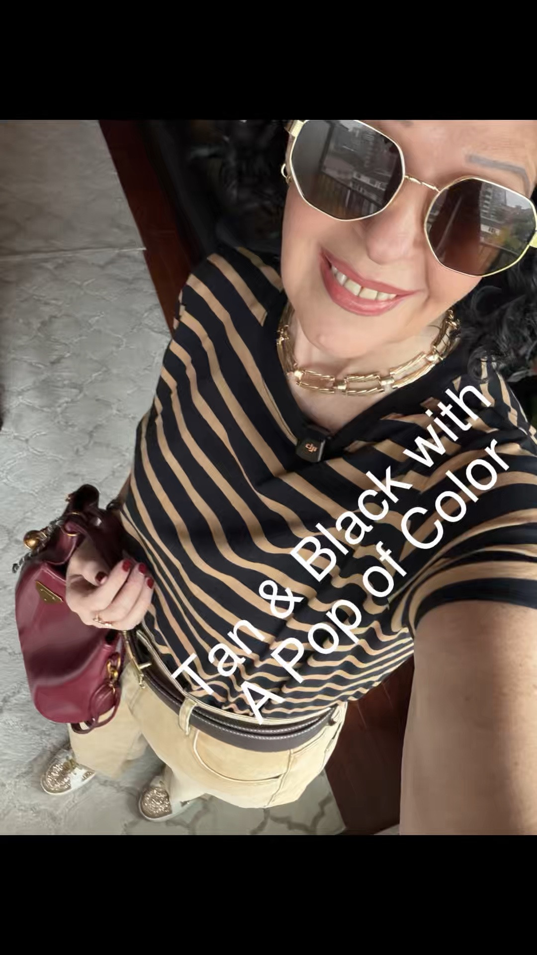 Tan and black with a pop of color!

#LTKcanada #LTKstyletip #LTKover50style