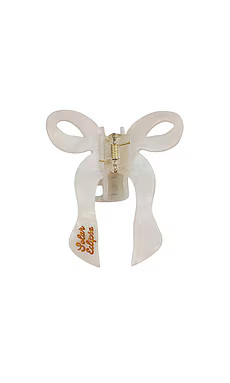 Solar Eclipse Hand-painted Coquette Bow Claw Hair Clip in White from Revolve.com | Revolve Clothing (Global)