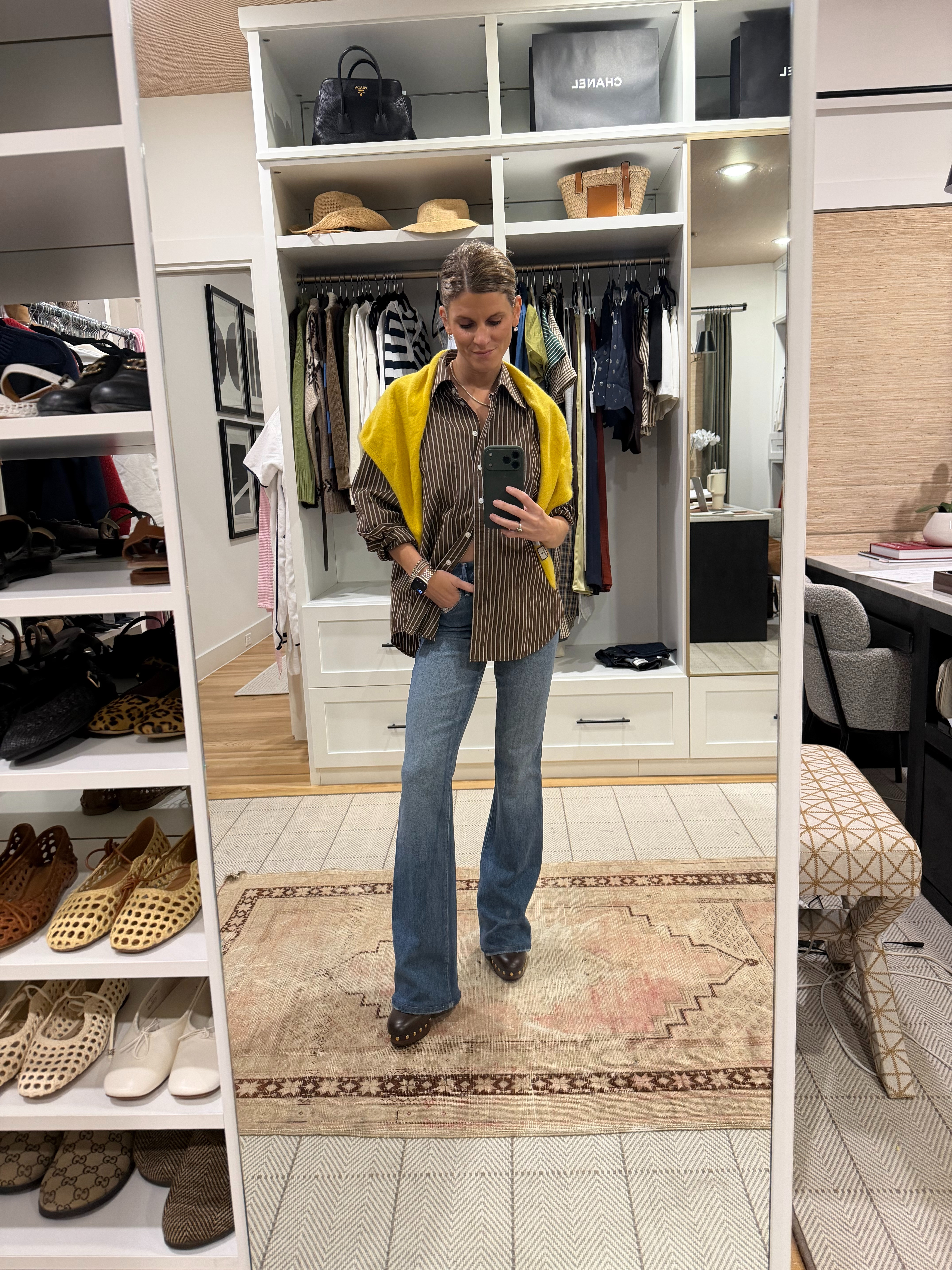 Good american slim flare jeans and gap brown striped button down 

 