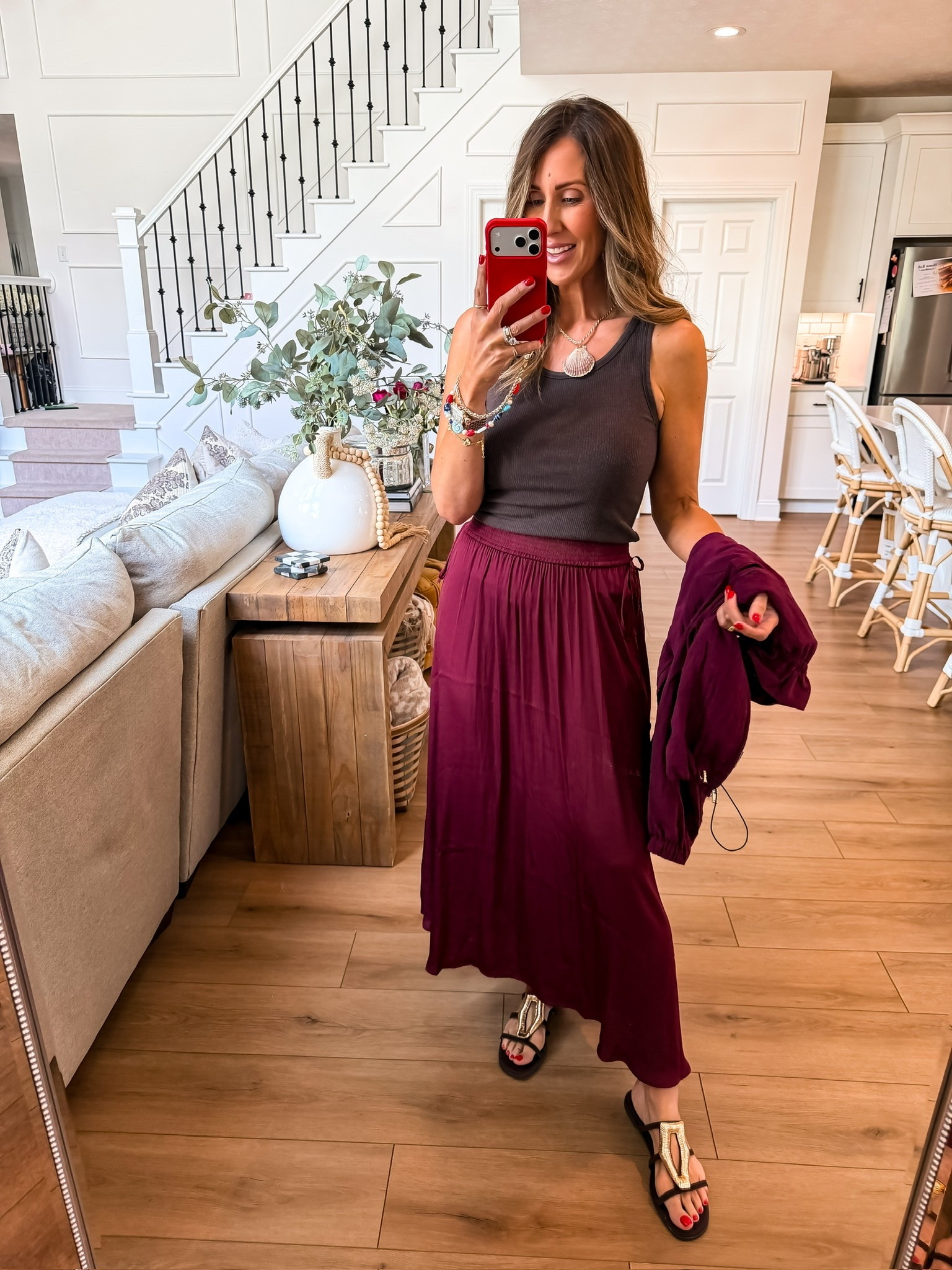 This color combo is SO good for summer 🤎 The chocolate brown tank with the rich berry skirt feels elevated, effortless, and a little designer inspired without trying too hard. Such a pretty look for dinner, vacation nights, or late summer into fall styling.

summer maxi skirt outfit, chocolate brown outfit, elevated casual style, vacation dinner outfit, effortless chic outfit, berry color trend, designer inspired outfit, summer to fall fashion, casual date night look, affordable style finds, maxi skirt styling, themominstyle

#LTKOver40 #LTKootd #LTKTravel