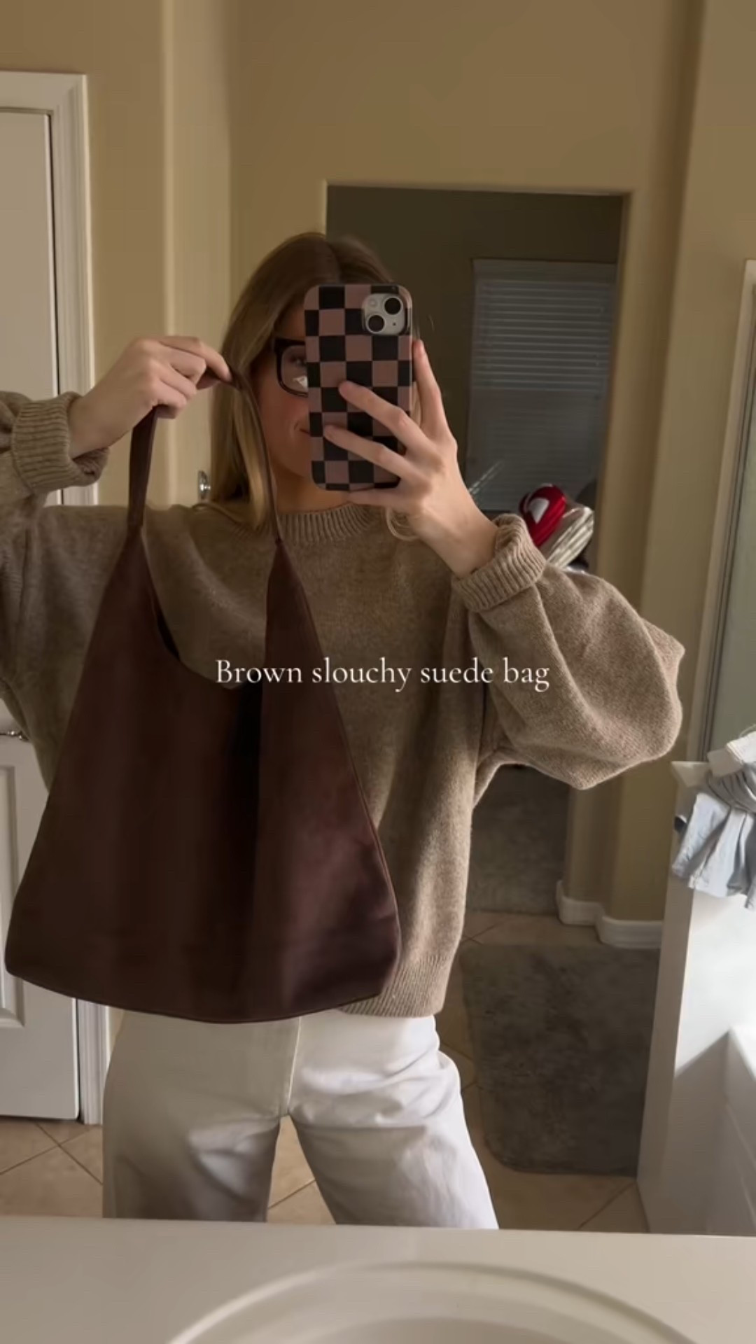 A brown slouchy bag that goes with everything>> 
•
•
•

#ClutchBag #EveningBag #AccessoryInspo #FashionAccessories #OOTD #StyleInspo #ChicStyle #DressyStyle #BoutiqueStyle #FashionFinds #OutfitDetails #StylishAccessories #WardrobeEssentials  #TrendyAccessories #StatementBag

#LTKootd #LTKU #LTKOver40