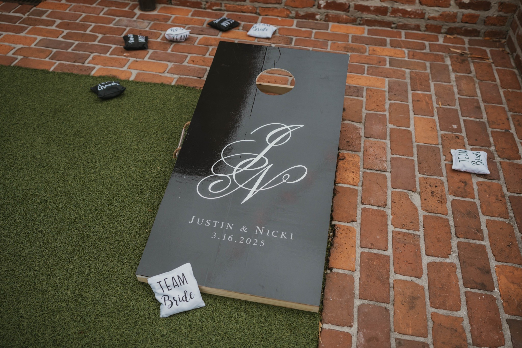 Customized cornhole boards for our cocktail hour 🤍 with team bride and team groom cornhole bags! 

#LTKWedding #LTKParties