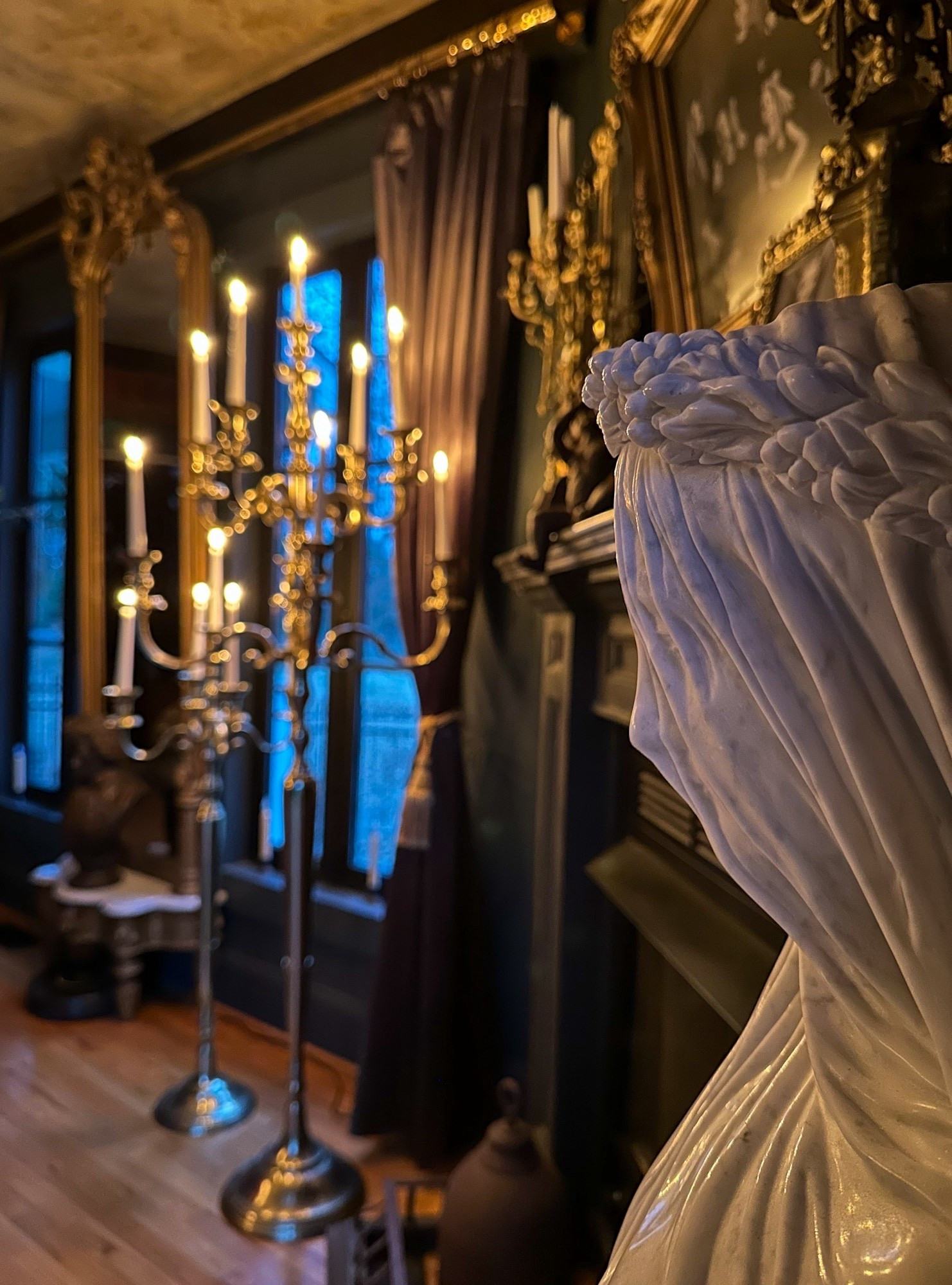 Nothing sets the tone quite like large floor candelabras paired with a gothic statue bust. Dramatic, sculptural, and softly lit, they create a space that feels rich, moody, and full of character. 🕯️🖤 

#MoodyInteriors #GothicDecor #CandelabraStyle #StatementPieces #DarkAndDramatic #HomeDecor #DesignDetails #callsigndesign