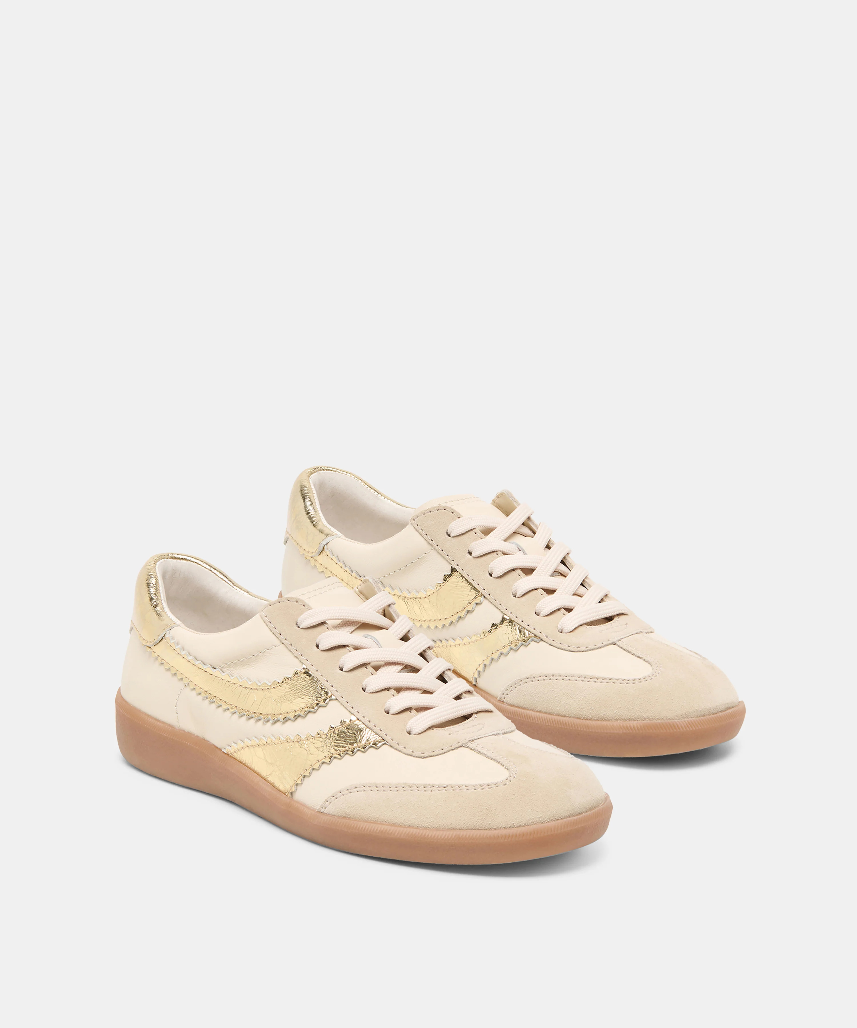 Merit White Gold Leather Sneakers | Dolce Vita | DolceVita.com