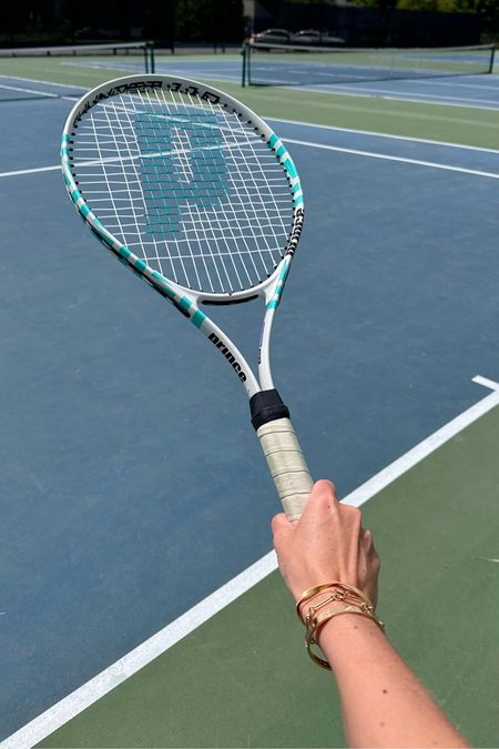 My favorite tennis items

Racquet 
Tennis racket 
Sneakers
Tennis shoes
Pleated shirt skort
Tennis skirt
Tennis bracelet 
Diamond bracelet 

#LTKStyleTip #LTKFitness #LTKFindsUnder100