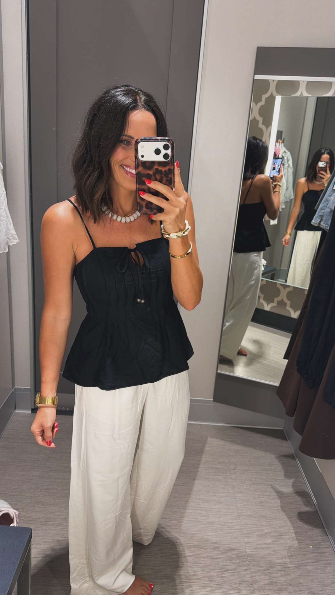 Such a cute Target outfit! I love how the black top dresses up the flowy white pants without trying too hard. This would be so good for dinner, vacation or even a casual date night! Wearing an XS.

#TargetStyle #TargetFinds #TargetFashion #AffordableFashion #LTKFinds