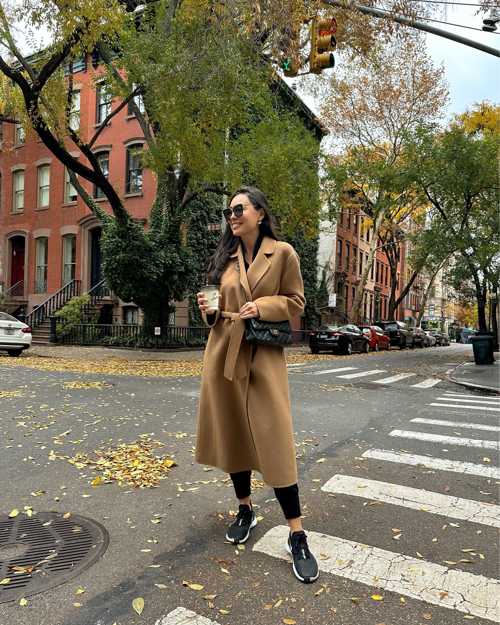 Kat Jamieson wears a camel coat and sneakers in the West Village. Casual outfit, travel style, fall outfit, jogger set. 

#LTKitbag #LTKtravel #LTKSeasonal