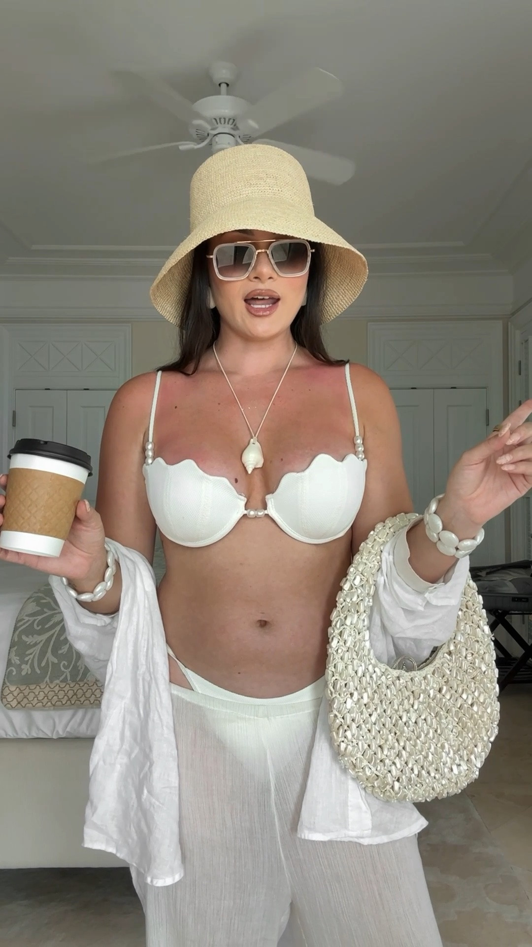 Get dressed with me for a beach day in Turks & Caicos - obsessed with this shell bikini from Lspace!

#LTKootd #LTKgrwm #LTKSwim