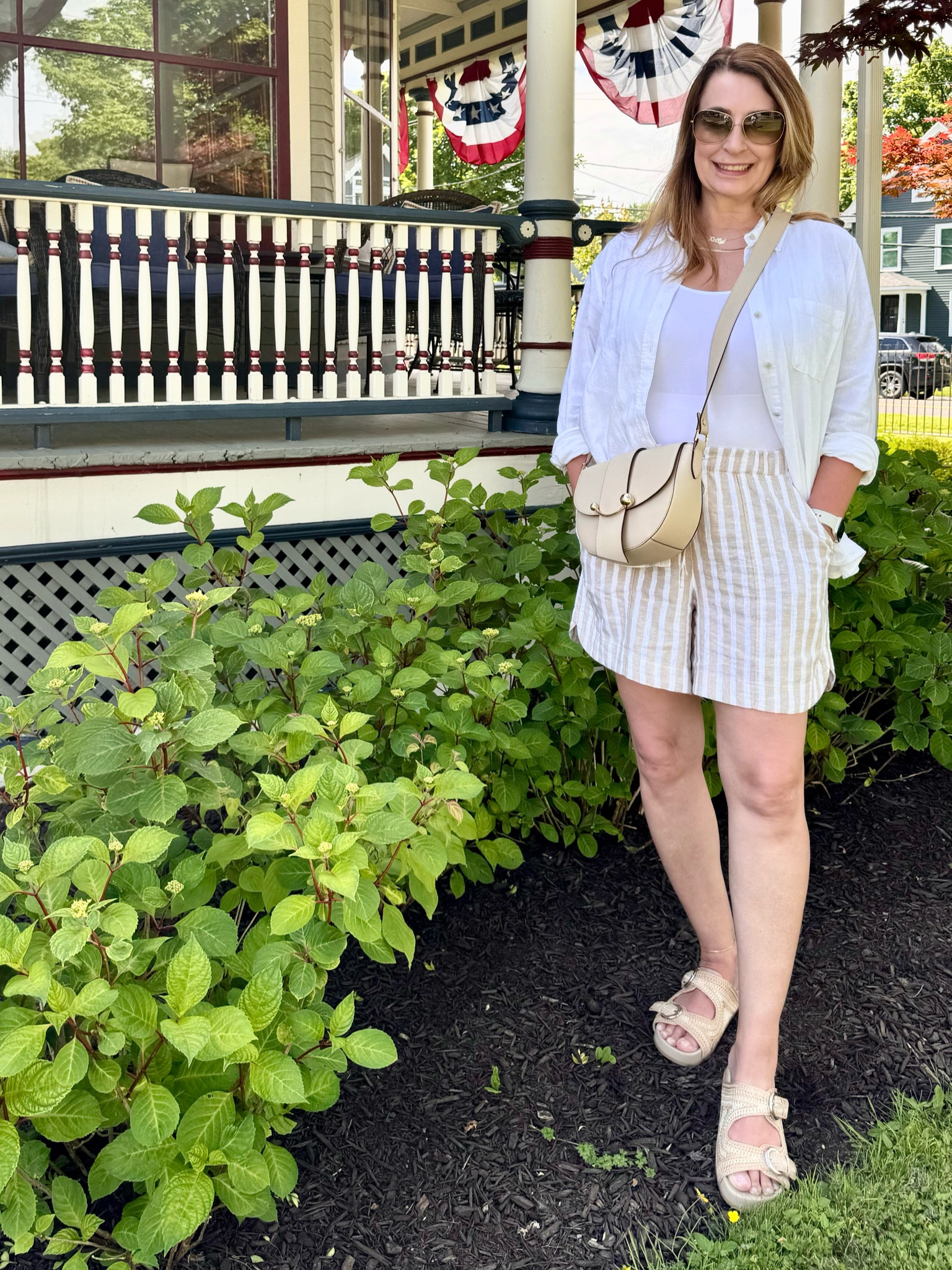 🎯 30% off shirts at Target! 🎯 
I declare this the perfect summer outfit! I swore off shorts until I found these linen beauties (I bought 3 pairs)! A classic white linen button down (roll those sleeves up), raffia sandals with a cushiony footbed so I can walk in them all day, and a perfectly sized cross body bag (I love this brand) and I’m ready for some ice cream!

#LTKSummerSales #LTKSaleAlert #LTKFindsUnder50