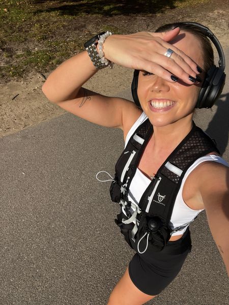 My running outfit from yesterday wearing Bose noise cancelling headphones with a classic running vest and lululemon align black shorts and white tank top!  

#LTKfitness