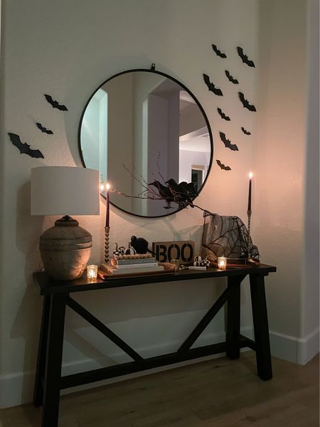 Spooky entryway vibes for Halloween 🎃 
*exact table linked (however I painted ours black) other similar console table options & {boo} signs linked as well! 

#LTKHalloween #LTKhome #LTKSeasonal