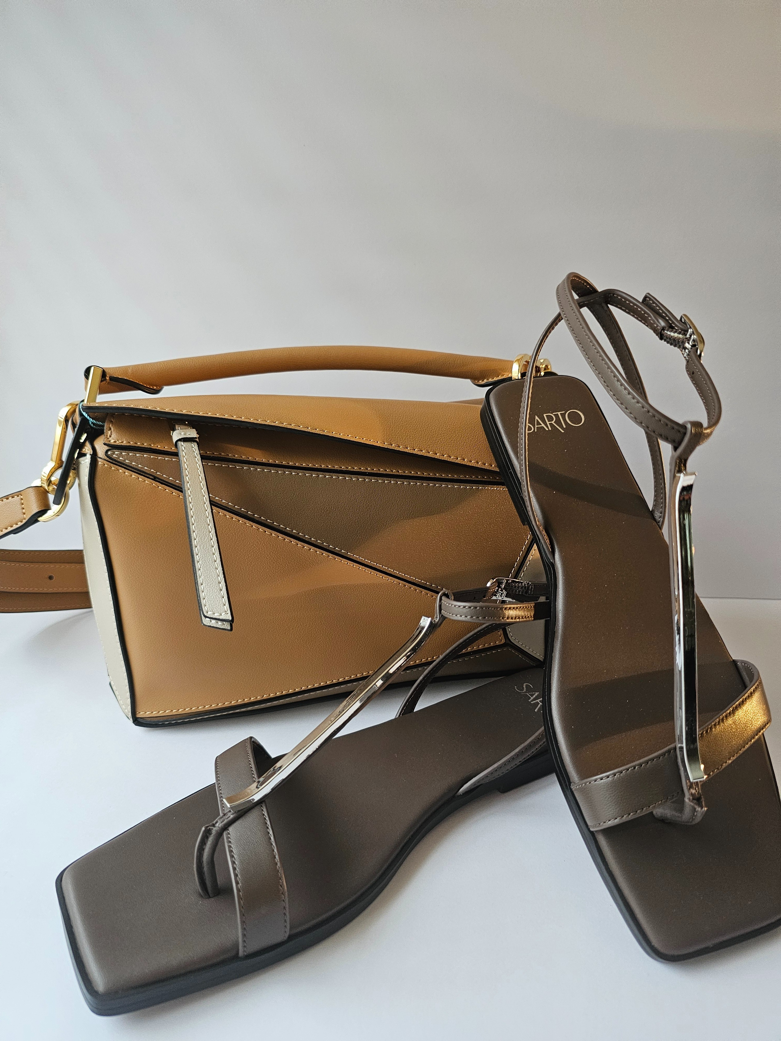 Latest handbag obsession. Loewe inspired at a fraction of the cost.  Two color options- both neutral on brown based the other is black.  Very impressed with the leather quality and bag details.

#LTKItBag #LTKShoeCrush #LTKStyleTip