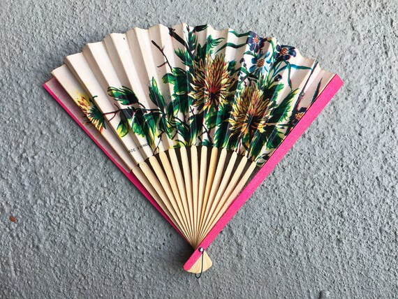 Lovely vintage paper fan. Colorful dandelion flower illustration on front. Sides are pink. Made in T | Etsy (US)