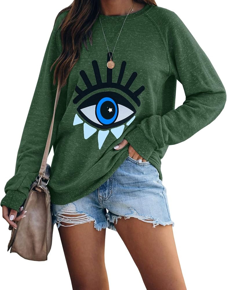 ReachMe Womens Evil Eye Printed Pullover Cute Graphic Crewneck Sweatshirts Long Sleeve Tunic Tops | Amazon (US)