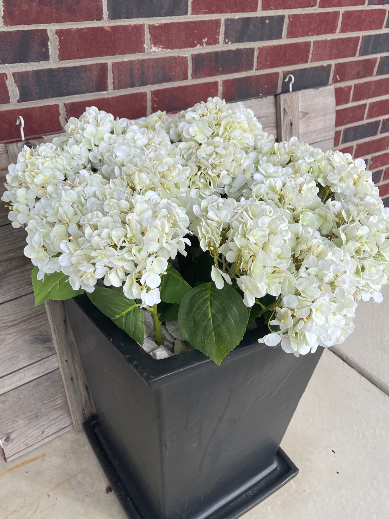 Love these soft faux hydrangeas for our posts outside our front door! Perfect for spring, and works great indoors or outdoors! 

Whit marble rocks set around stems, faux stems tucked into dirt inside our planters 😊

Walmart home, Walmart spring decor, Walmart summer, faux flowers, spring home decor

#LTKSeasonal #LTKFindsUnder50 #LTKHome