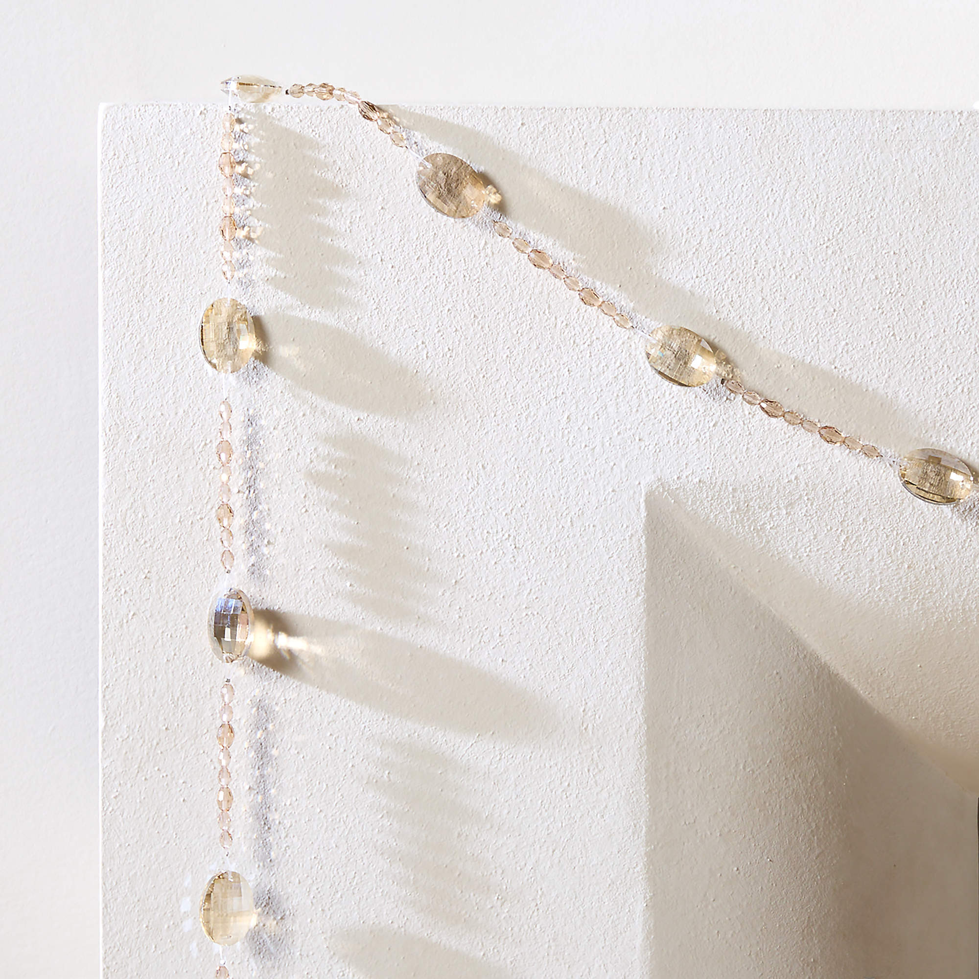 Theia Crystal Champagne and Clear Holiday Garland 72" + Reviews | CB2 | CB2
