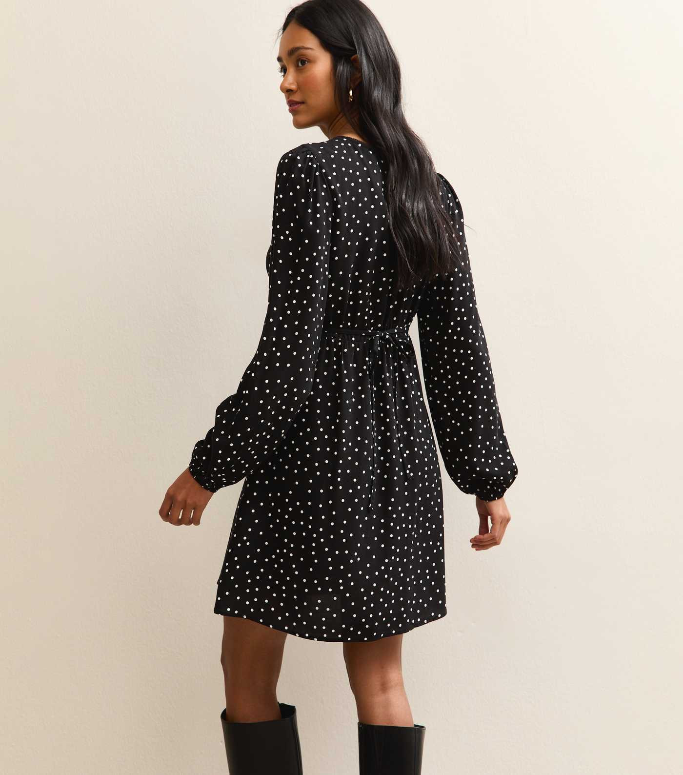 Black Polka Dot Long Sleeve Flutter Mini Dress | New Look | New Look (UK)