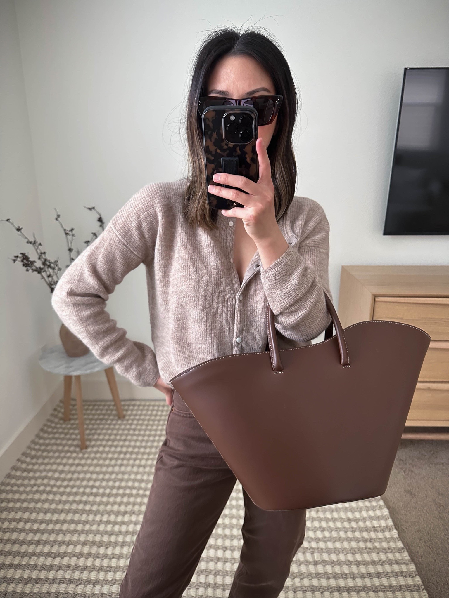 Sezane Gaspard cardigan. Runs TTS. 

Sezane try-on, Sezane Haul, chocolate brown, petite style, neutral outfits. 

Cardigan - Sezane xs
Jeans - Gap 26. Sized up 2 sizes. 
Bag - Little Liffner medium tulip 
Loafers - Sam Edelman 5
Sunglasses - Celine



#LTKsalealert #LTKstyletip #LTKunder50