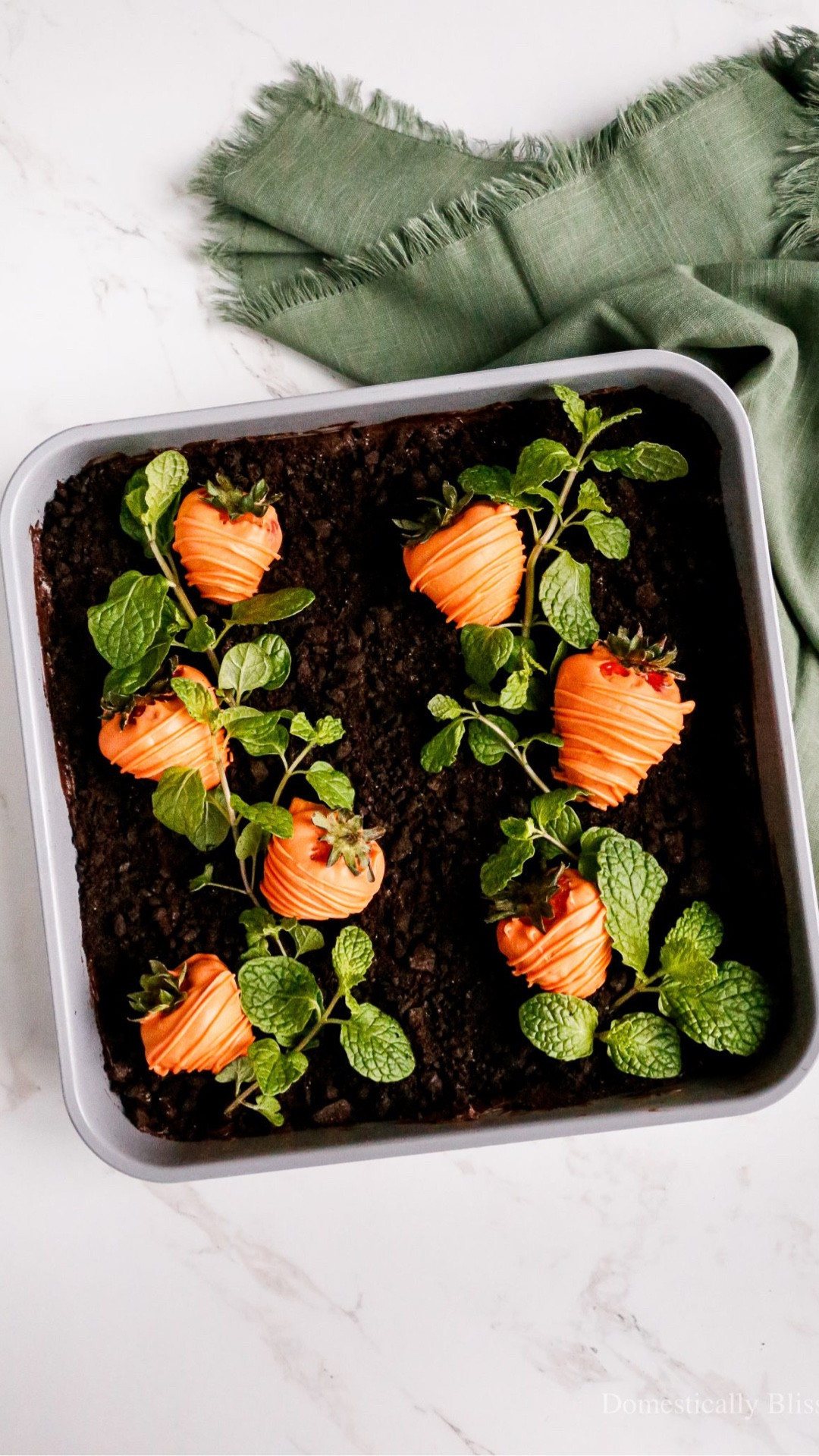This Brownie Carrot Patch is a quick and easy dessert topped with dipped strawberries that look like carrots and fresh mint making it perfect for spring and Easter parties.

See details:
https://domesticallyblissful.com/brownie-carrot-patch/



#LTKfoodie #LTKSeasonal #LTKHome