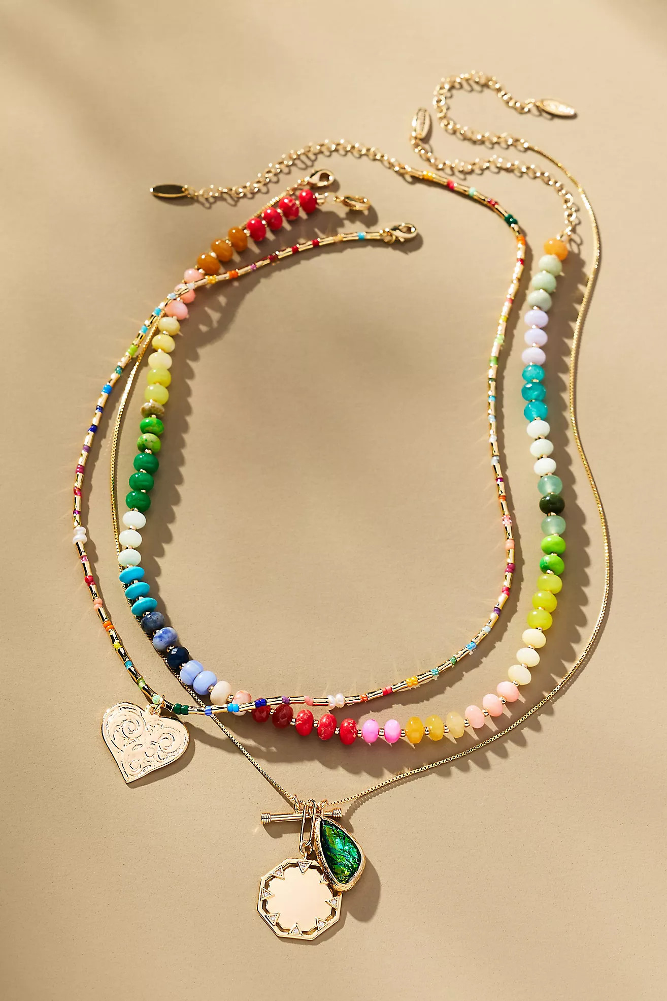 Shades of Sea Layered Necklaces: Charm Edition | Anthropologie (US)