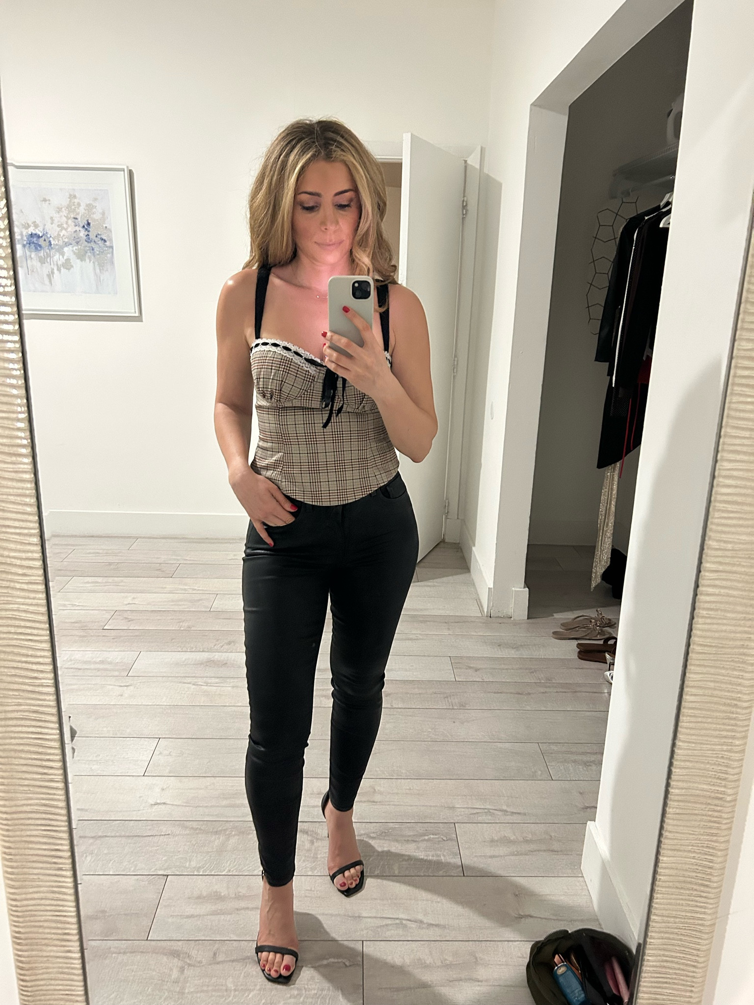 Plaid corset top with black leather pants. #revolve #revolvehaul #leatherpants #corsettop

#LTKParties #LTKTravel #LTKStyleTip