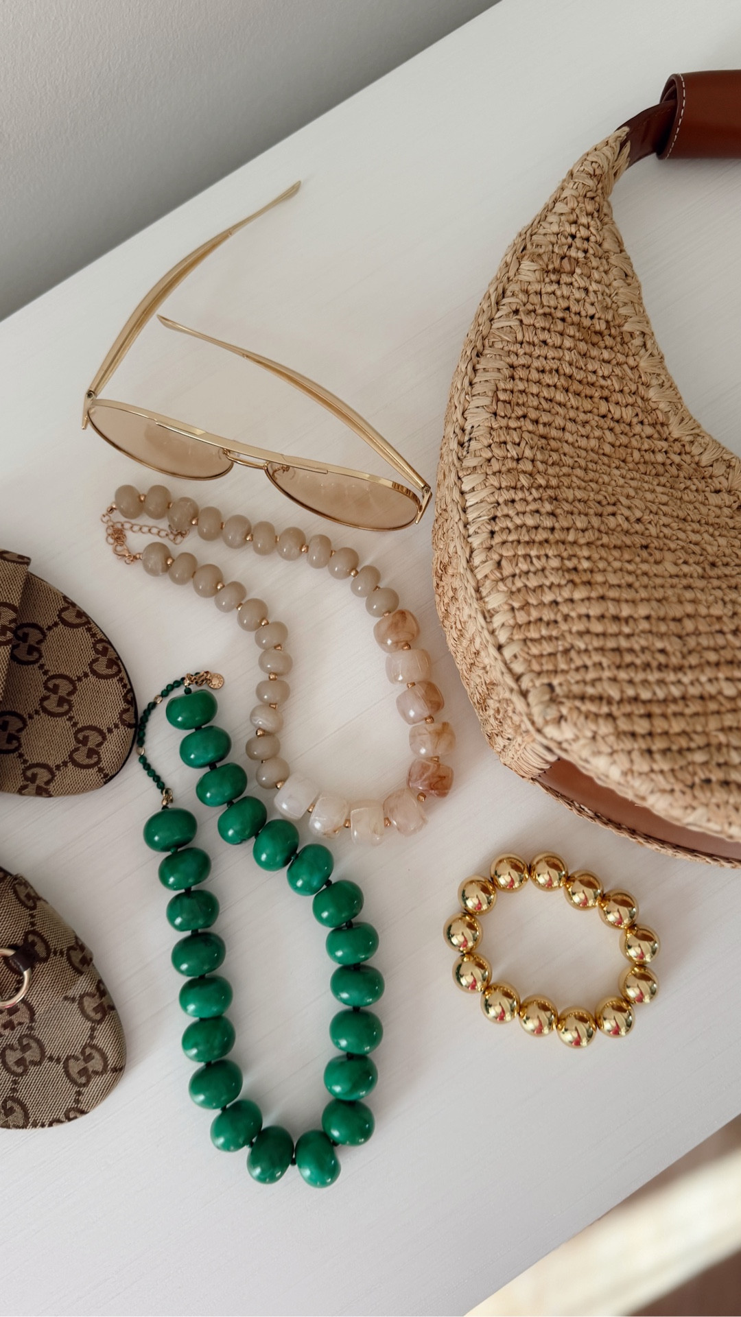 Spring 2026 accessories! 🤍 Chunky necklaces are everywhere right now and I’m packing mine for spring break! 🌴 The lighter one is 50% off☀️ & they’re already bestsellers + the quality is so beautiful. 

Necklace. Spring break. Raffia. Gucci sandals. Sunnies. 

#LTKSeasonal #LTKootd #LTKBeauty