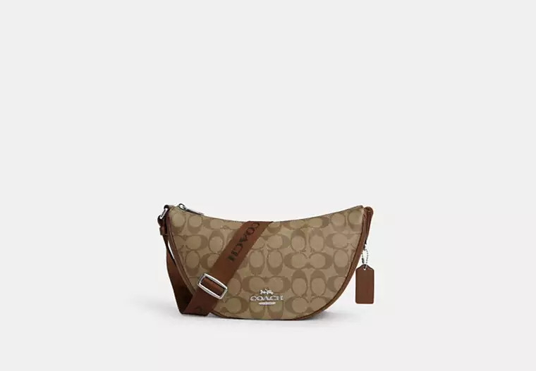 Coach Outlet Pace Shoulder Bag In Signature Canvas - Brown | Coach Outlet US