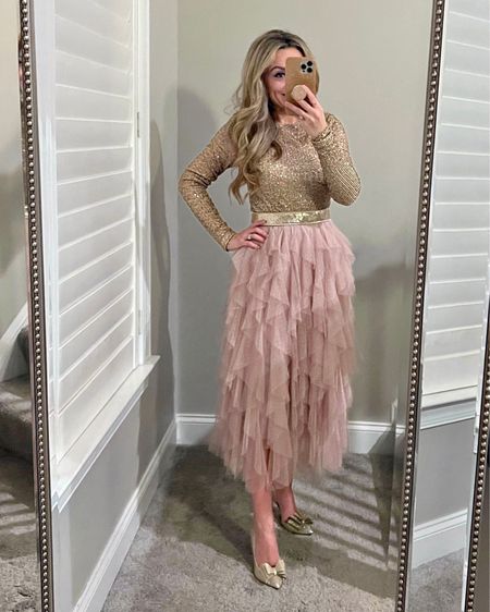 Holiday party outfit, I’m wearing size XS in top and XS petite bottom. I am 5’3” for reference. Belt is my daughter’s but it stretches to waist size 30! 

Tulle skirt, sequin top, Holiday style,

#LTKparties #LTKstyletip #LTKHoliday
