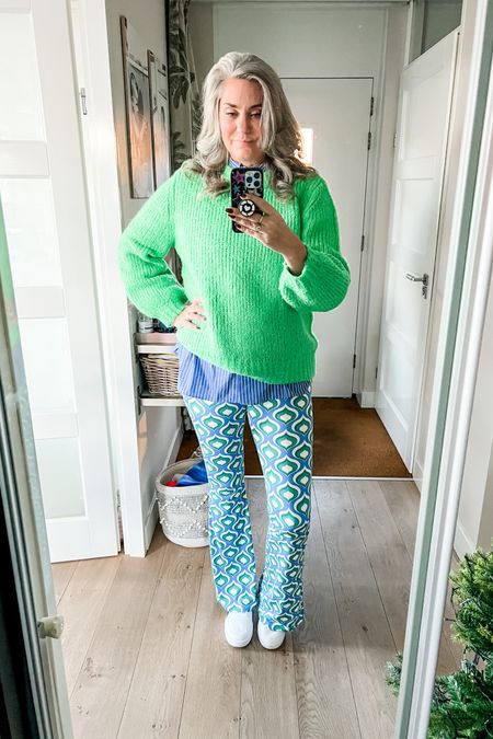 Ootd - Thursday. Bright green wool oversized sweater (very old, C&A) over a striped shirt paired with a graphic print flared legging (old, local boutique) and white Puma sneakers. 



#LTKeurope #LTKstyletip #LTKmidsize