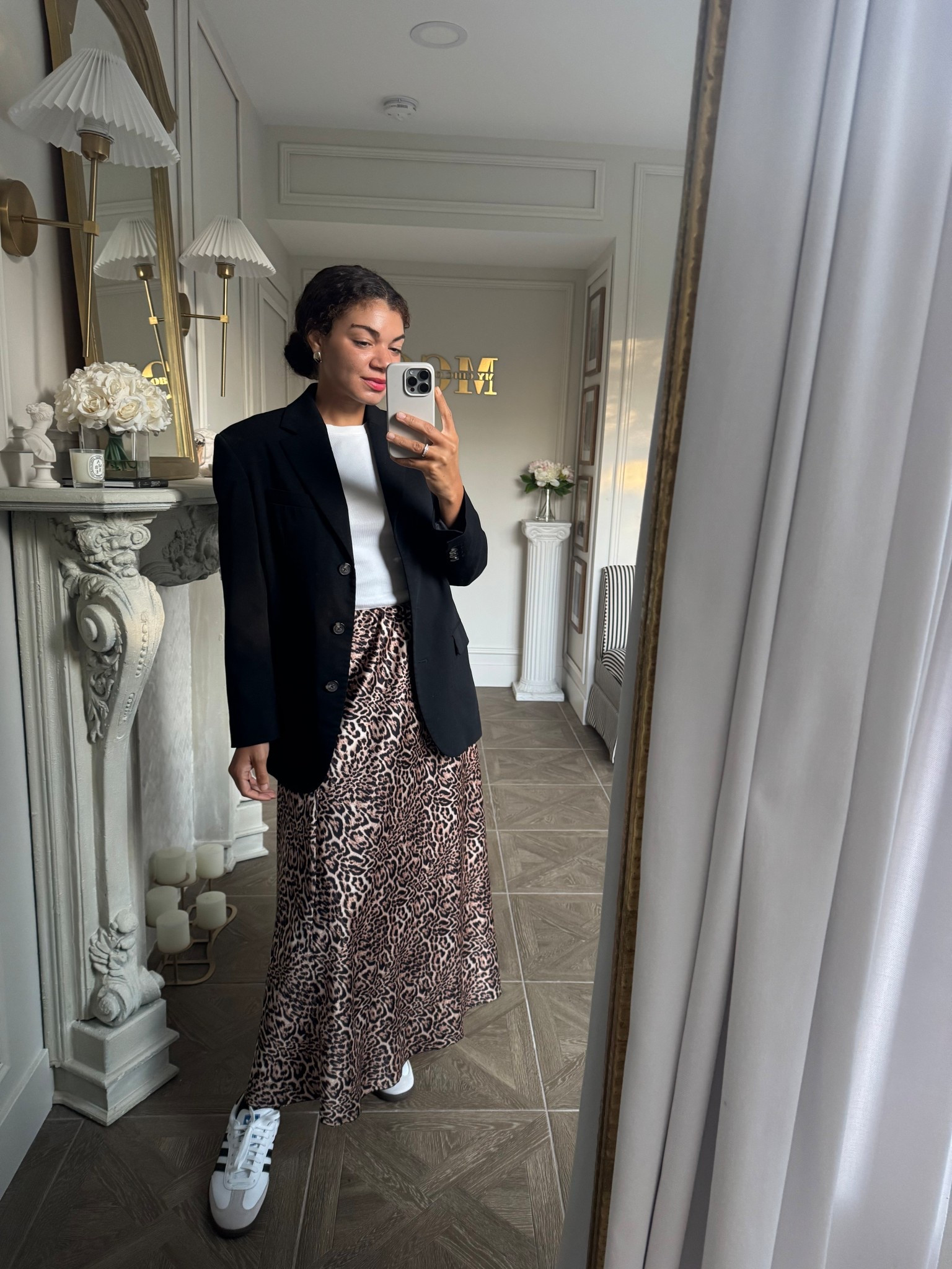 Casual fall outfit: leopard print slip skirt, adidas samba sneakers, white tee, oversized black blazer 

#LTKStyleTip #LTKSeasonal #LTKFindsUnder100