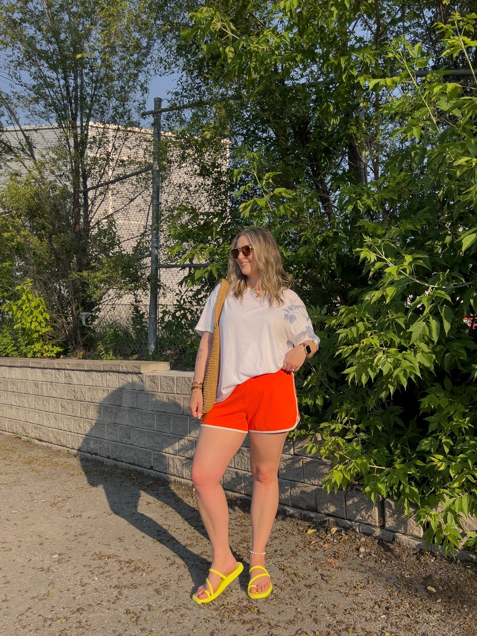 Comfy casual summer outfit! Wearing my usual size L in both the white tee and red orange dolphin shorts. Crocs sandals are super comfy, I’m a 9.5-10 and wear a 10

#LTKsummer #LTKsale #LTKmidsize
