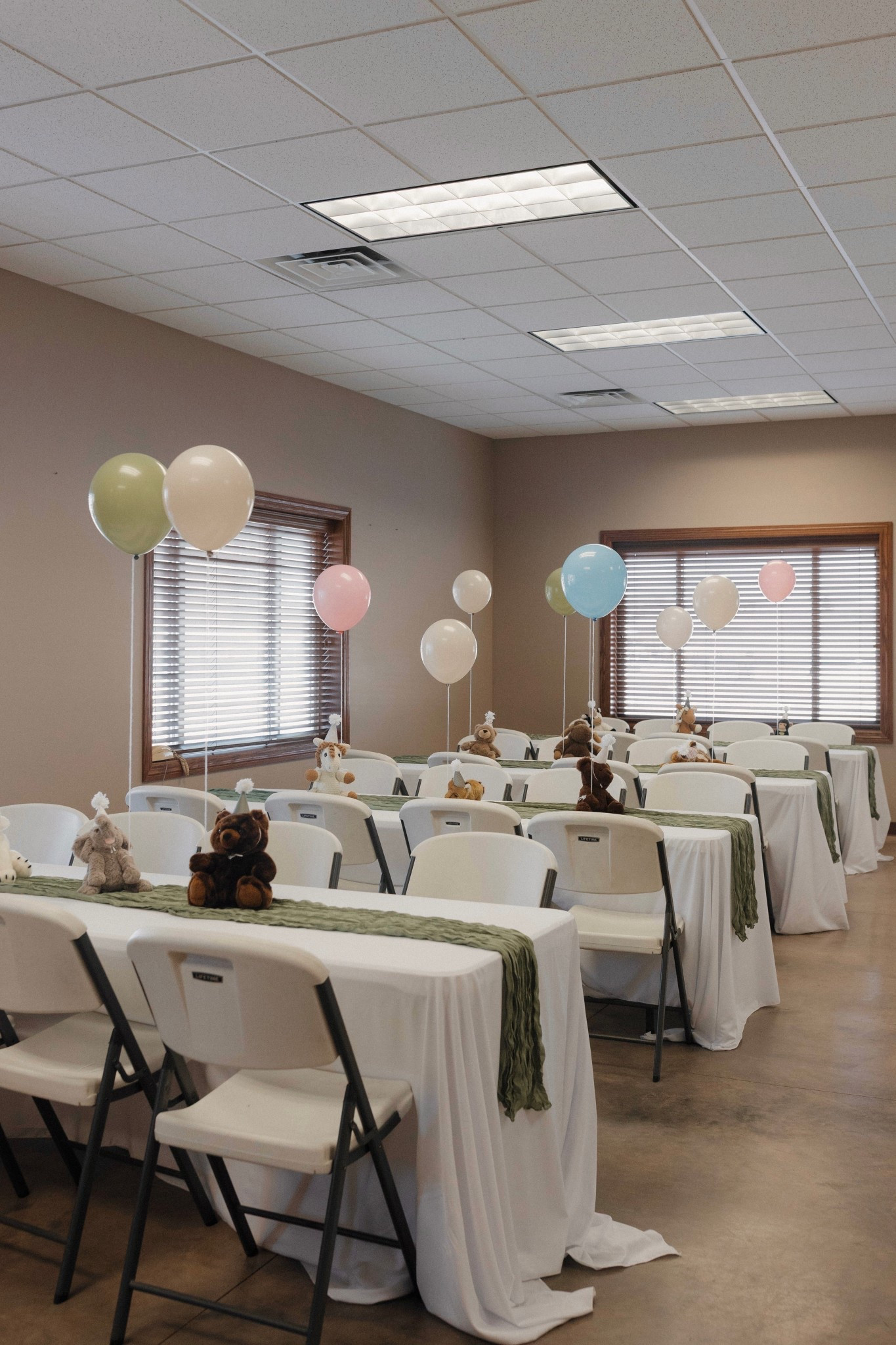 
Boy girl twin first birthday party decor | gender neutral birthday party | birthday tablescape | birthday party decor 

I have gotten so much use out of these table linens! 

Cream, green, blue and pink balloons all from Hobby Lobby. 