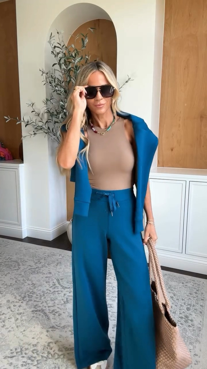 Elevated travel outfit - this loungewear set is so luxe and the wide leg pants come in length options! Perfect airport outfit or just a comfortable everyday outfit for mom life that is so elevated ✨

#traveloutfit #airportoutfit

#LTKTravel #LTKmomlife #LTKootd