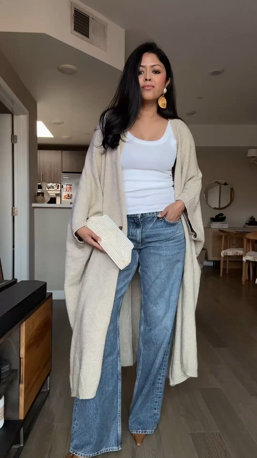 I’ve had this duster for years! I linked it belowbut it is no longer available. Wearing jeans size 27. Clutch and earrings are vintage.

#LTKootd #LTKgrwm #LTKdayinmylife