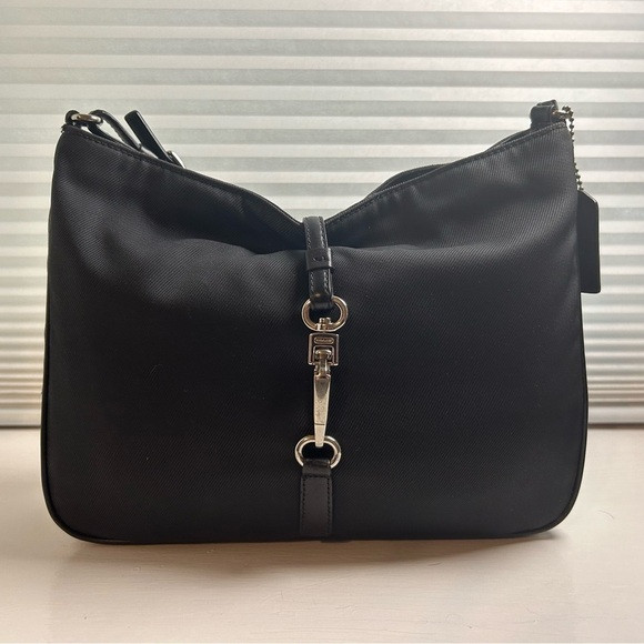 Coach Vintage 7443 Mercer Clip Hobo
- Black | Poshmark