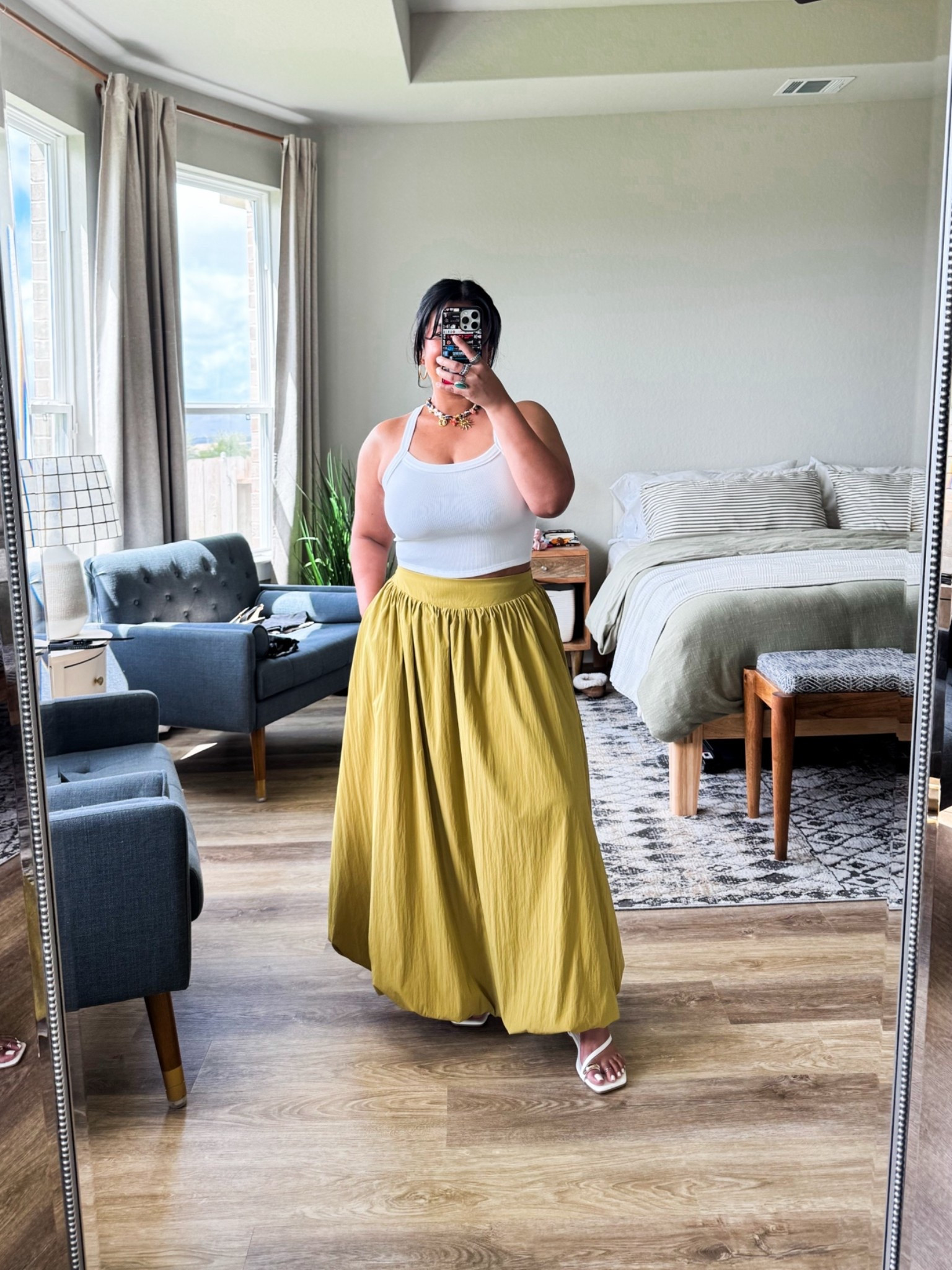 I'm 5'1" size 12 // TANK: size M/L sooo stretchy and has good compression and hold. No bra, just nip covers // SKIRT: size L, true to size // sandals are true to size

#LTKPetite #LTKMidsize #LTKOver40
