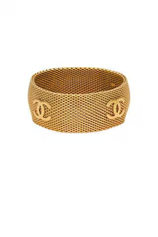 Chanel Coco Mark Bangle Bracelet in Metallic Gold | FWRD 